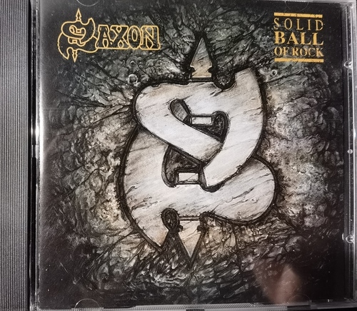 Saxon – Solid Ball Of Rock