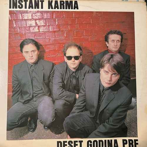Instant Karma – Deset Godina Pre