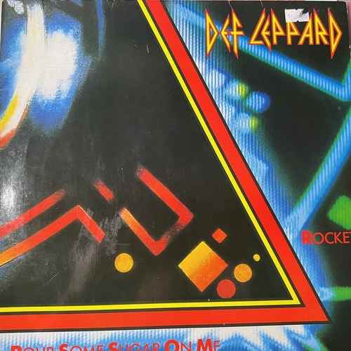 Def Leppard – Pour Some Sugar On Me / Rocket